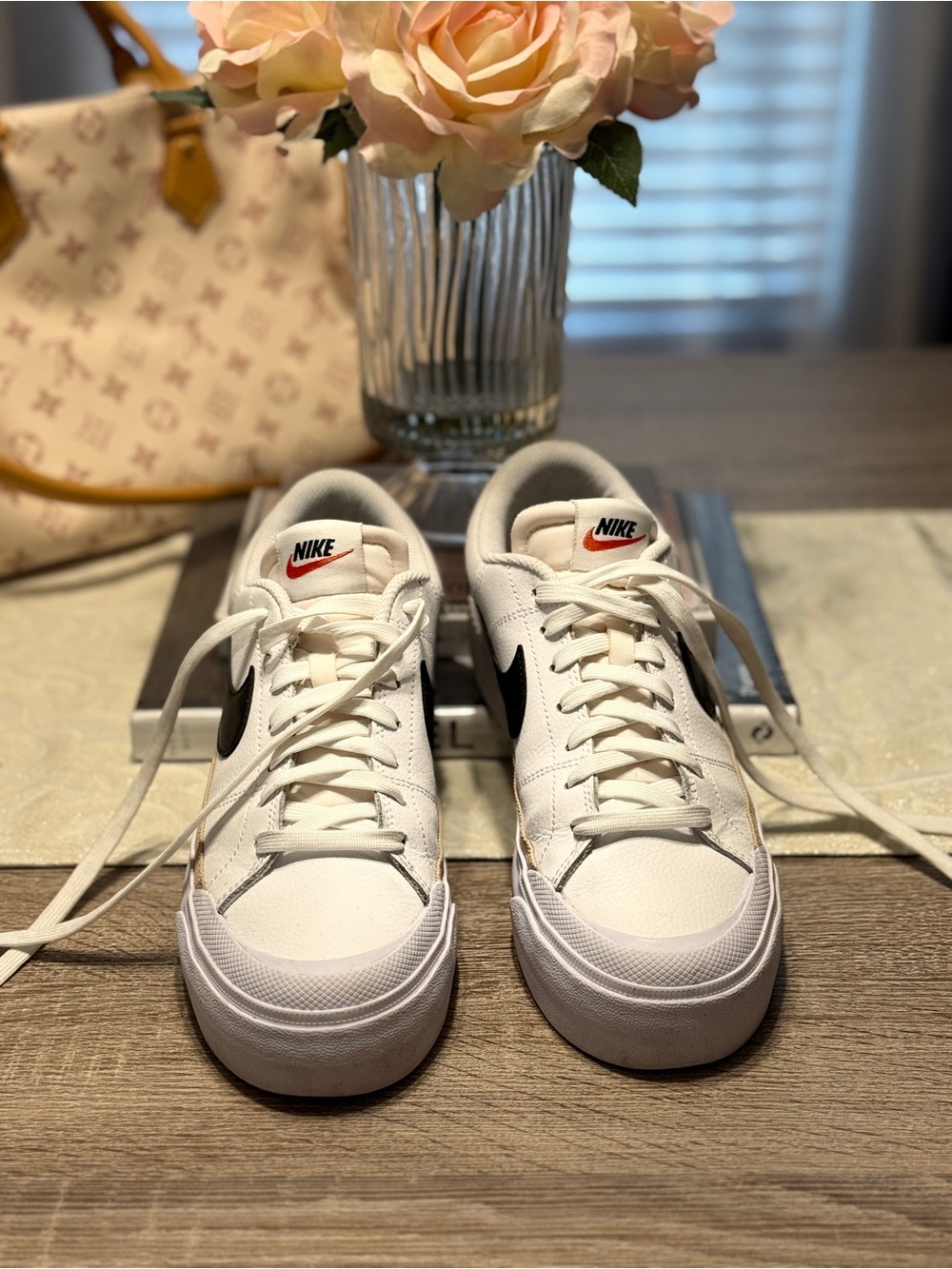 Nike White Sneakers with Black Swoosh
